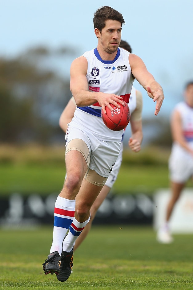 VFL 2015 Rd 17 - Williamstown v Footscray MELBOURNE, AUSTRALIA - AUGUST 09: Jordan Russell of Footscray runs with the ball during the round 17 VFL match between Williamstown and Footscray at Burbank Oval on August 9, 2015 in Melbourne, Australia. (Photo by Robert Prezioso/AFL Media/Getty Images)